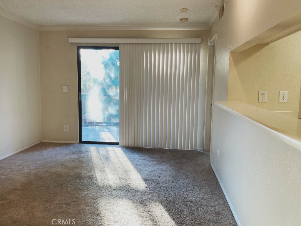 10655 Lemon Avenue, Unit 3509 Rancho Cucamonga, CA 91737 - Photo 2 of 15 an empty room with windows