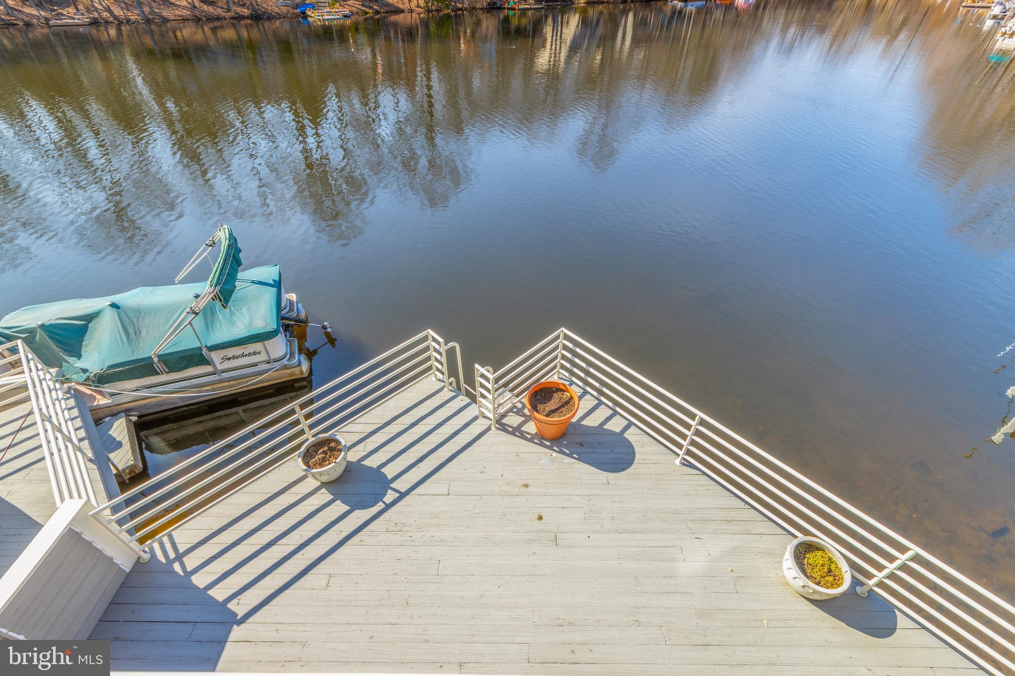 1973 Lakeport Way Reston, VA 20191 - Photo 31 of 69 Hi to the lower level large deck and boat hook up!