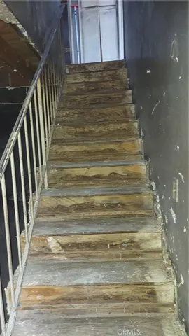 a kitchen with a stove and a window