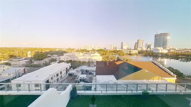 a kitchen with a sink and large cabinets
