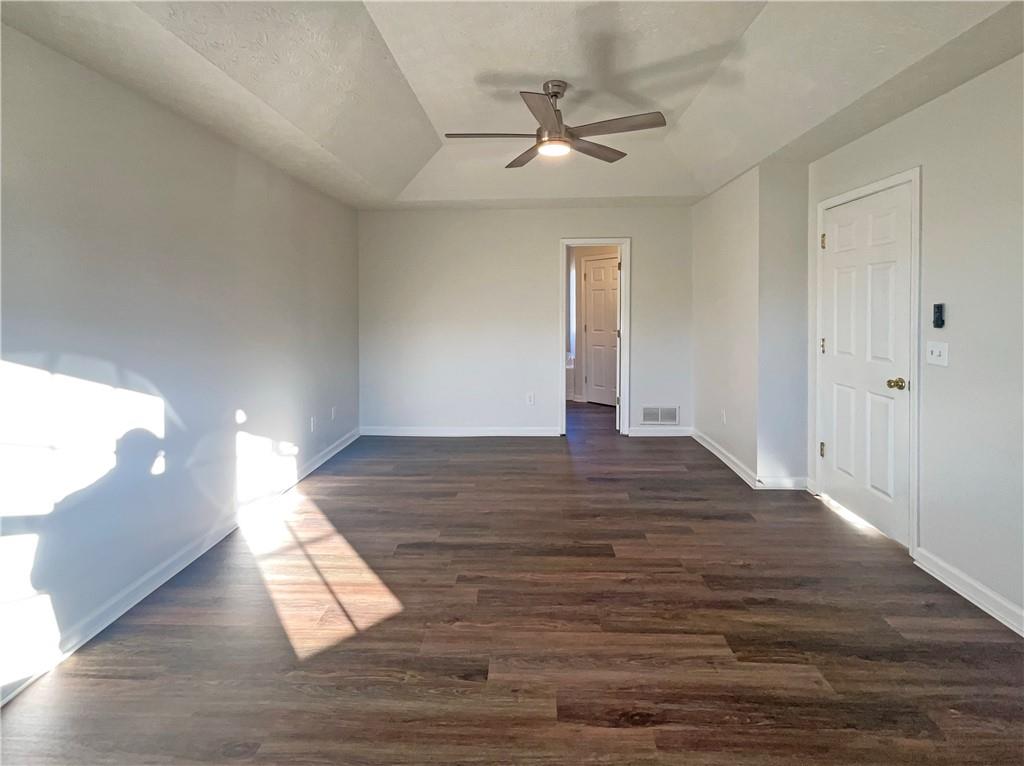 16 Fairview Glen Dallas, GA 30157 - Photo 17 of 26 a view of empty room with wooden floor and fan