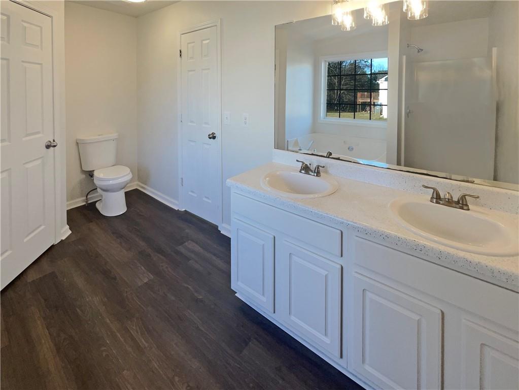 16 Fairview Glen Dallas, GA 30157 - Photo 18 of 26 a bathroom with a sink and a mirror