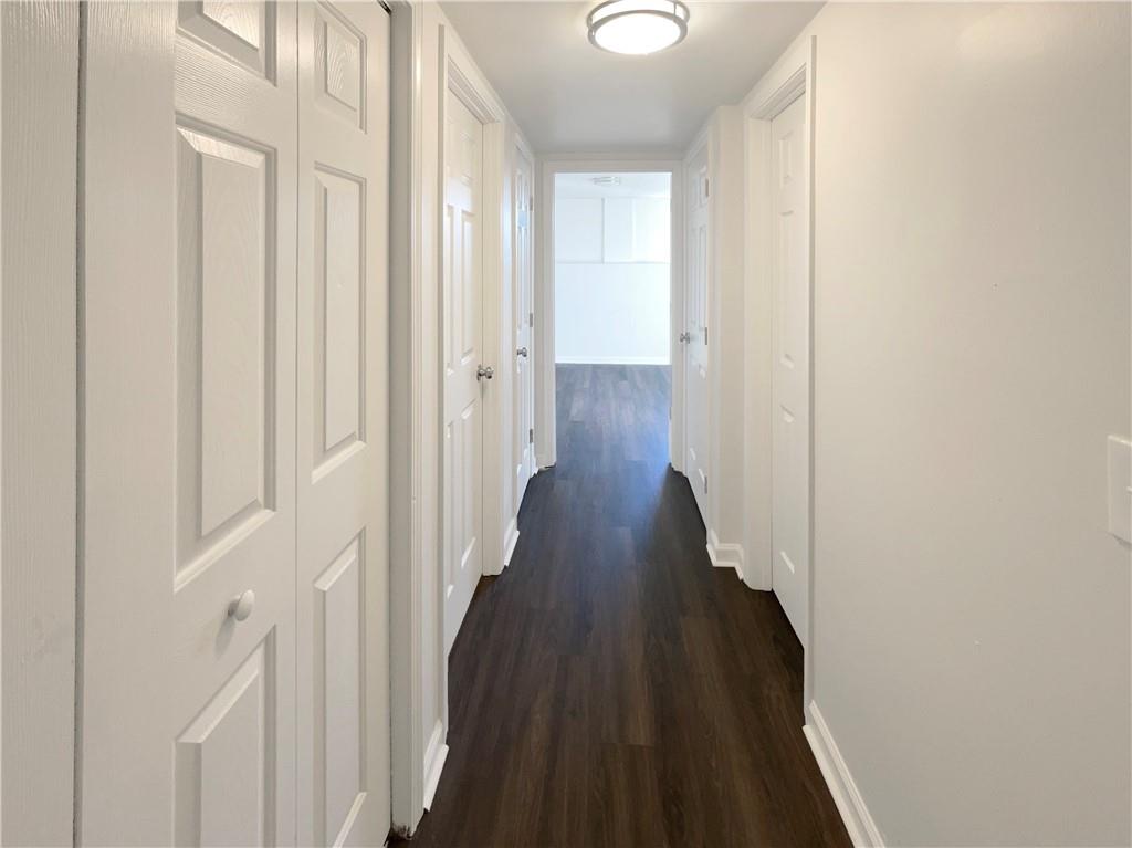 16 Fairview Glen Dallas, GA 30157 - Photo 22 of 26 a view of a hallway with wooden floor