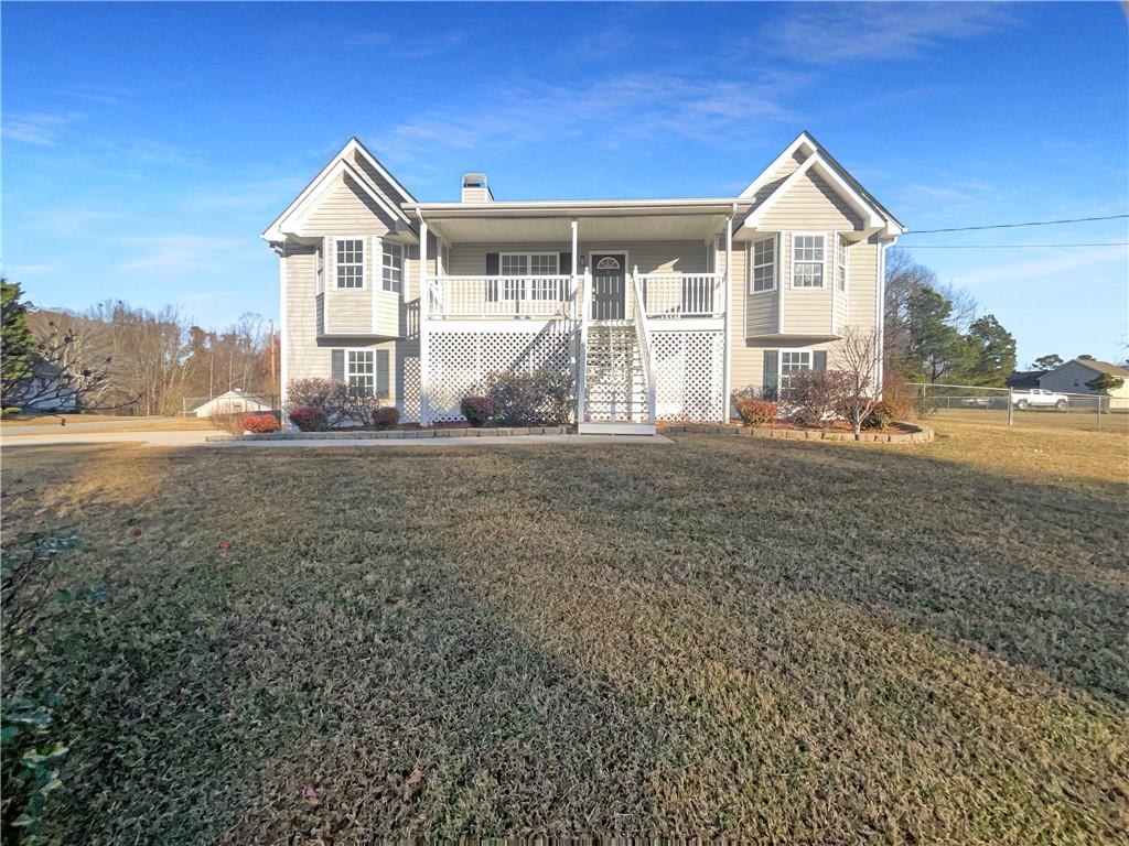 16 Fairview Glen Dallas, GA 30157 - Photo 7 of 26 a front view of a house with a yard