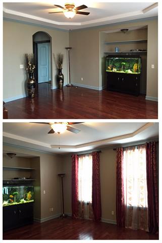 Picture your formal antique furnishings in the warmth of this Living Room, situated to the right of the staircase. Like most of the rooms in this home, the architectural detail is lovely.