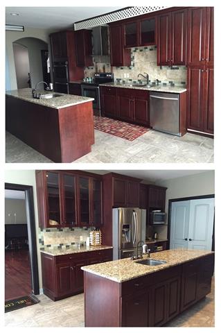 From the den, we enter the Chef’s kitchen. Yes, at 21’x13’ it’s huge! Granite counters, Samsung appliances, an 8 foot island with vegetable sink and an 8’x6’ pantry!!