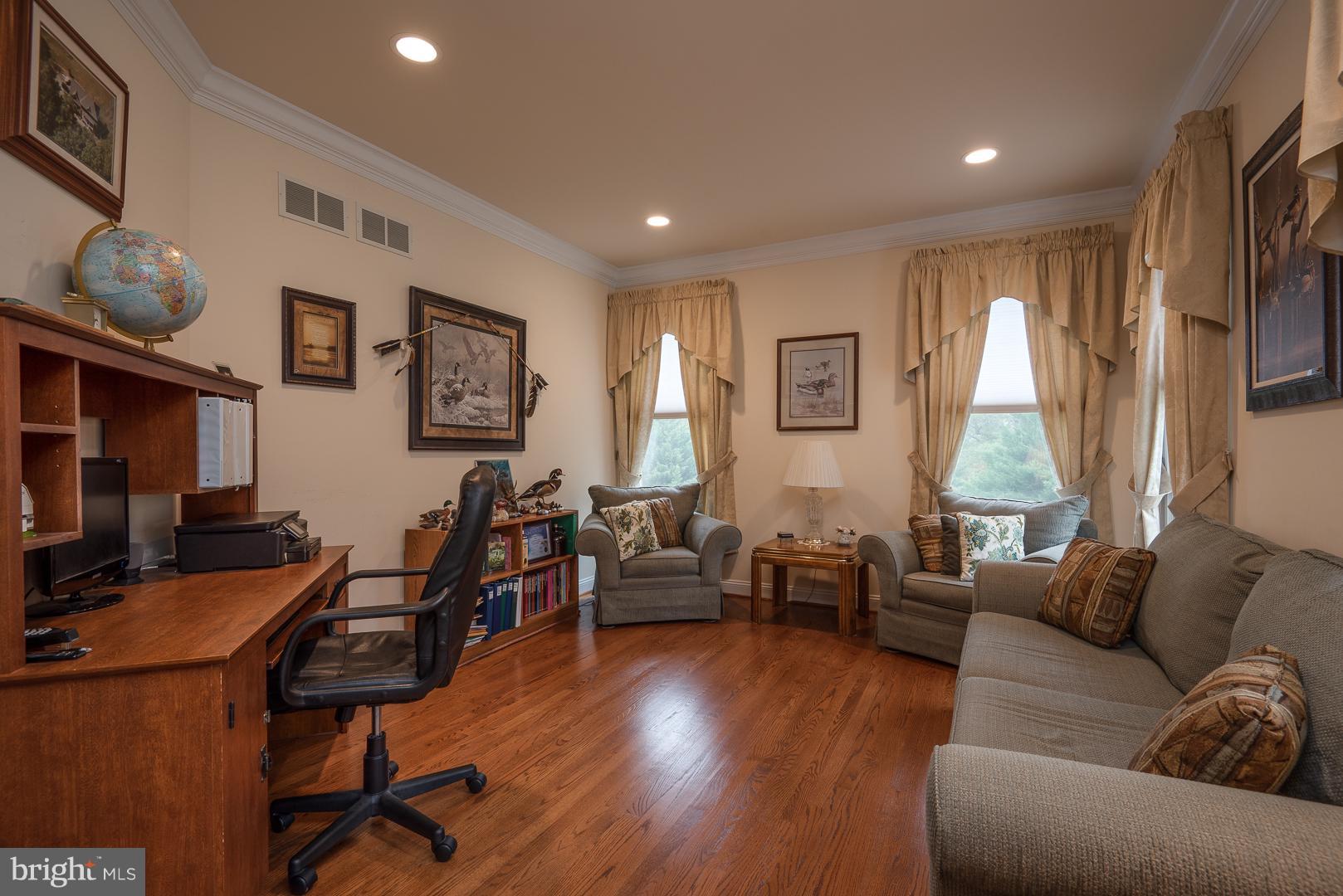 Bright living room with hardwood floors