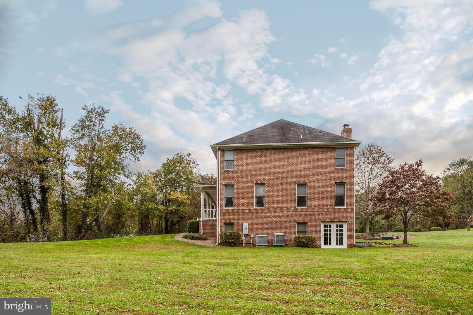 7466 Lower Waterloo Road Warrenton, VA 20186 - Photo 25 of 31 Side view with basement door