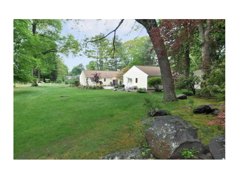 33 Forge Road North Kingstown, RI 02852 - Photo 2 of 24 Exterior Back. Beautifully landscaped yard with new plantings and new patio. Very private 41,031 sf lot (250 x 178 x 219 x 175 +/-).<BR/>Shed.