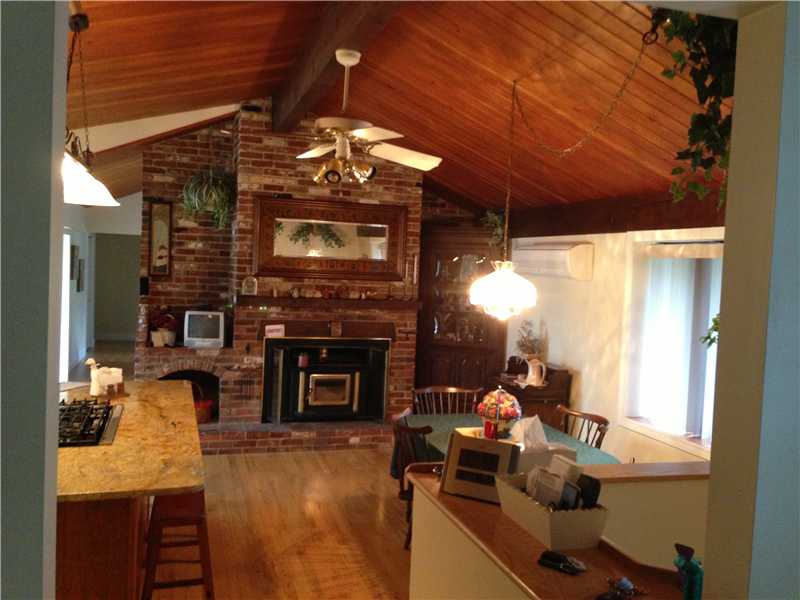 33 Forge Road North Kingstown, RI 02852 - Photo 7 of 24 Kitchen. vaulted tongue in groove ceilings; hardwood floors; access to lower level (on right)
