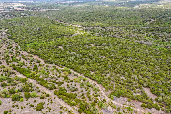 a view of a field with an outdoor space