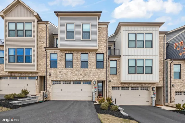 a front view of a building with a street