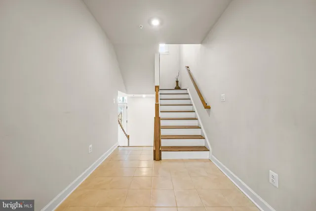 a view of entryway with stairs