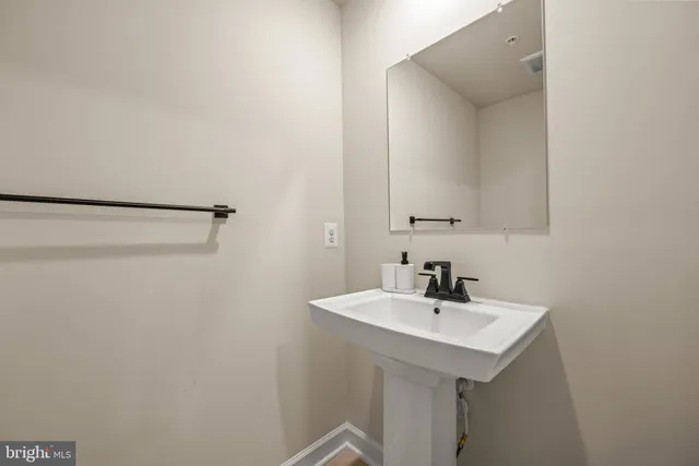 a living room with fireplace furniture and a flat screen tv