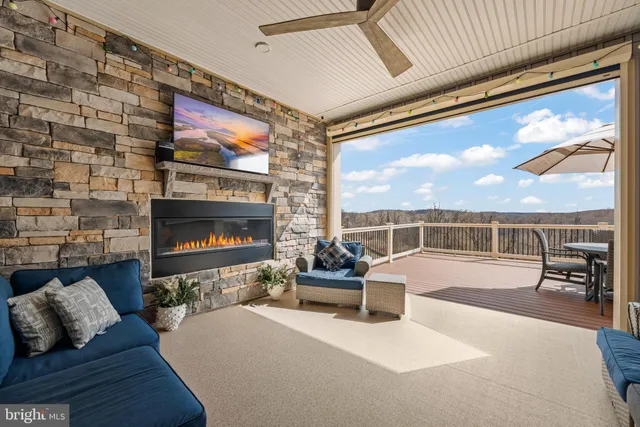 a view of a deck with furniture