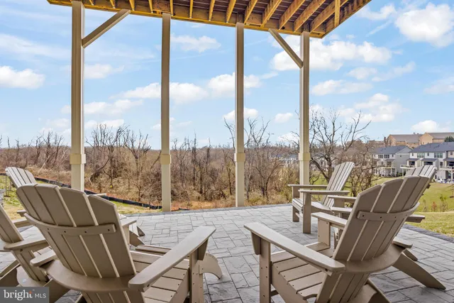 a view of balcony with furniture
