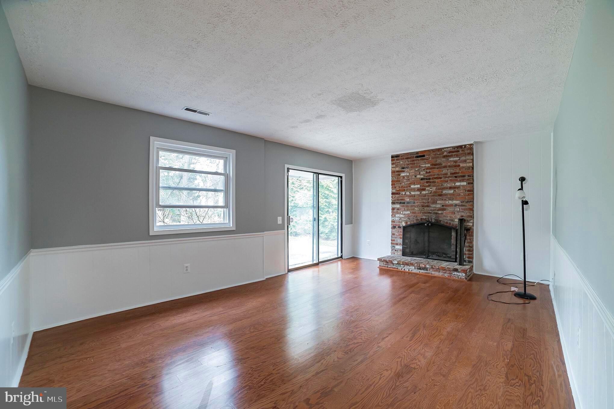 2413 Countryside Drive Silver Spring, MD 20905 - Photo 23 of 30 Rec Room with Wood-Burning Fireplace