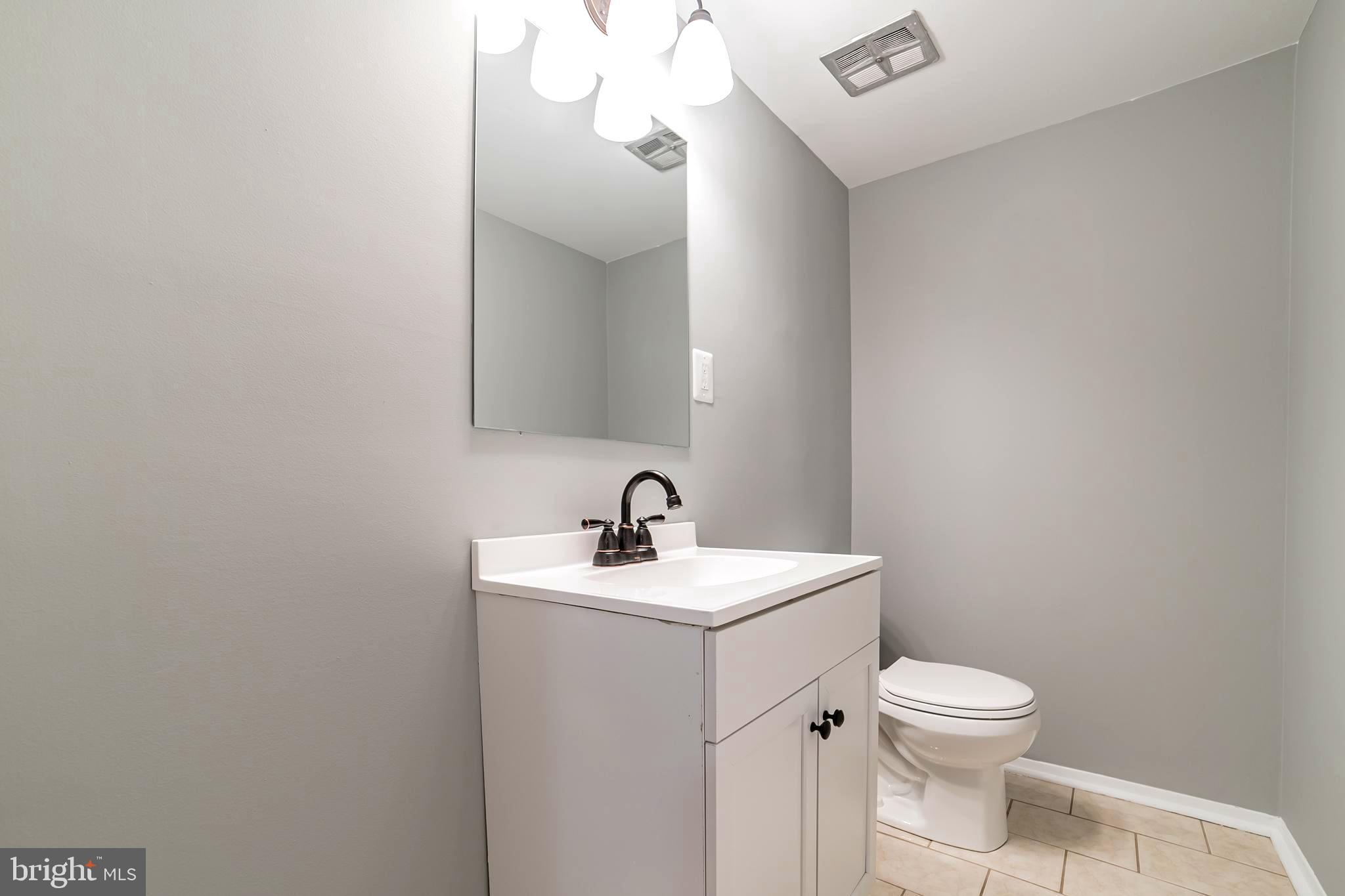 2413 Countryside Drive Silver Spring, MD 20905 - Photo 25 of 30 Lower Level Powder Room