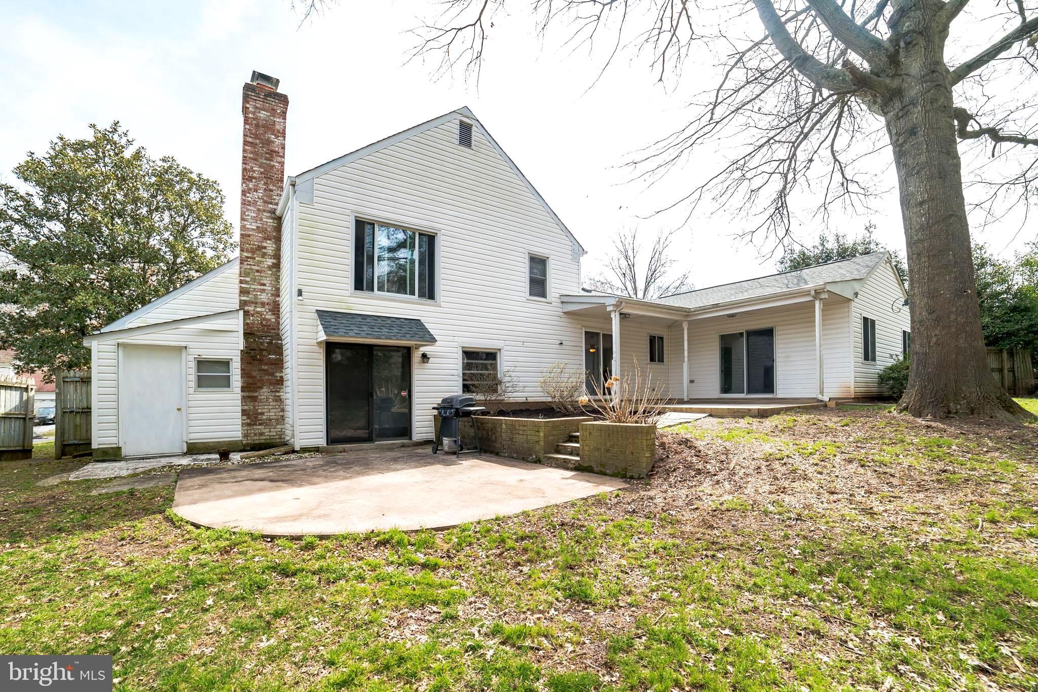 2413 Countryside Drive Silver Spring, MD 20905 - Photo 29 of 30 Rear View of House with Two-Tiered Patio