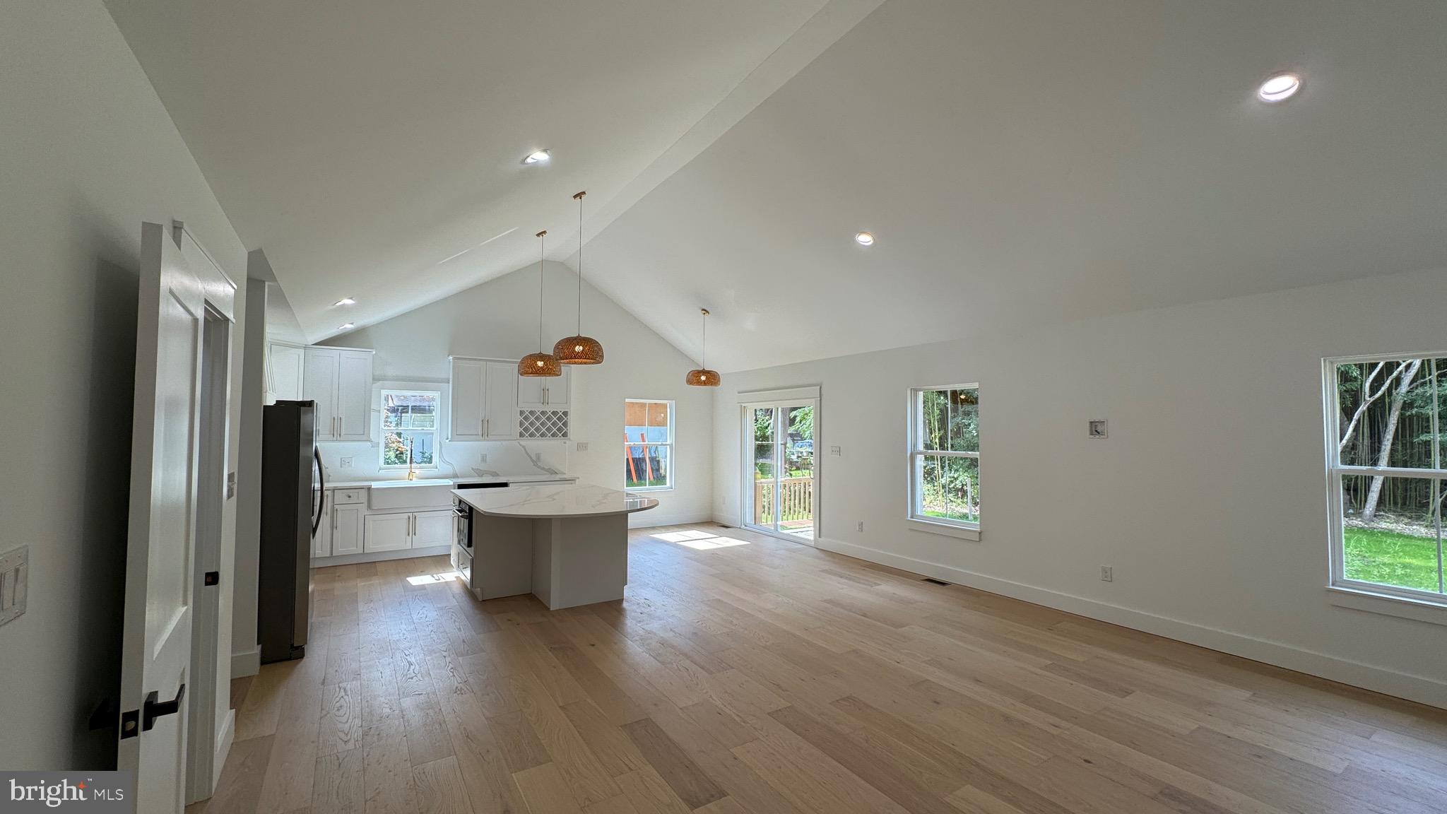340 Honeymoon Road Glassboro, NJ 08028 - Photo 11 of 110 a view of a big room with wooden floor and windows