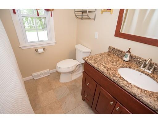 42 Piper Road West Springfield, MA 01089 - Photo 12 of 35 a bathroom with a granite countertop sink a mirror and a toilet