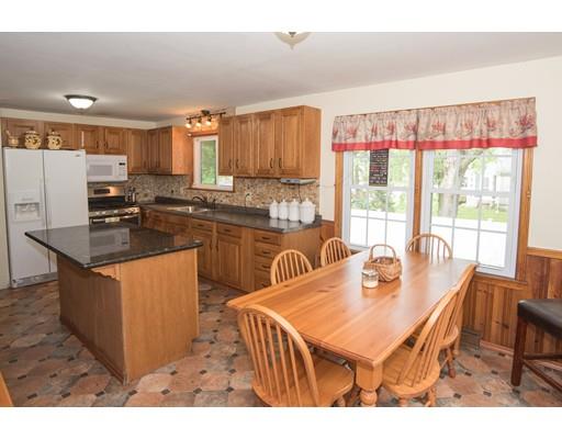 42 Piper Road West Springfield, MA 01089 - Photo 18 of 35 a kitchen with stainless steel appliances granite countertop a stove a sink a refrigerator and a dining table