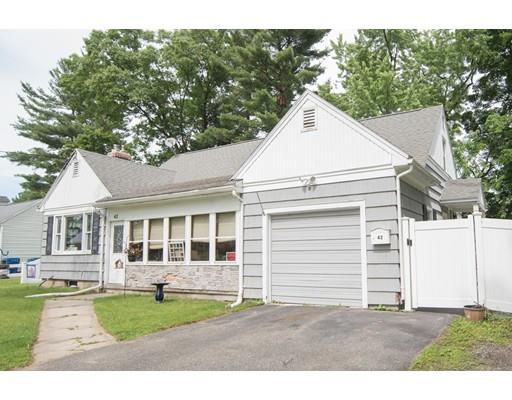 42 Piper Road West Springfield, MA 01089 - Photo 2 of 35 a view of a white house next to a yard with big trees