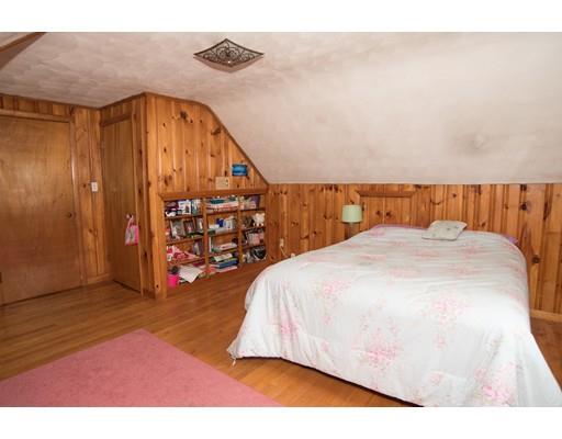 42 Piper Road West Springfield, MA 01089 - Photo 25 of 35 a bed sitting in a bedroom next to a window and a wooden floor