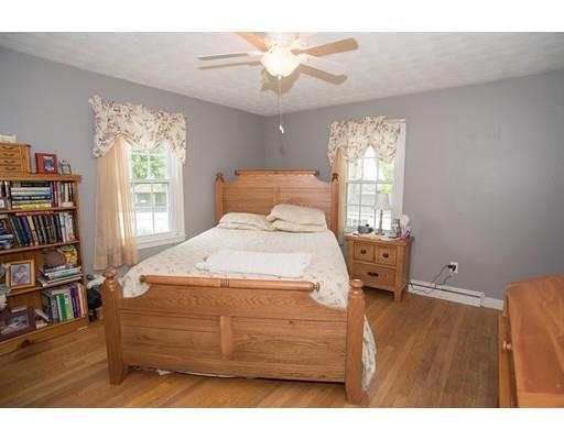 42 Piper Road West Springfield, MA 01089 - Photo 9 of 35 a bed room with a bed and a book shelf