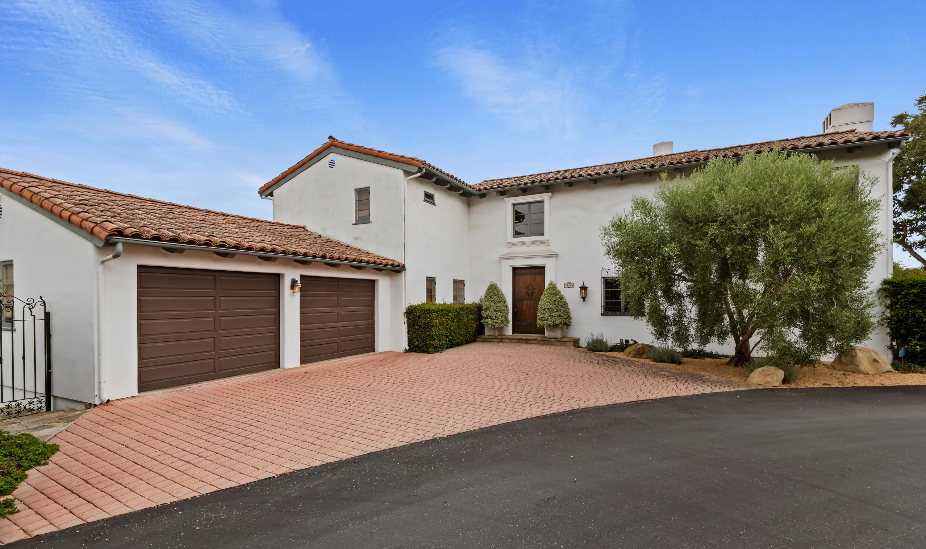 931 Knapp Drive Santa Barbara, CA 93108 - Photo 1 of 40 a front view of a house with a yard and garage