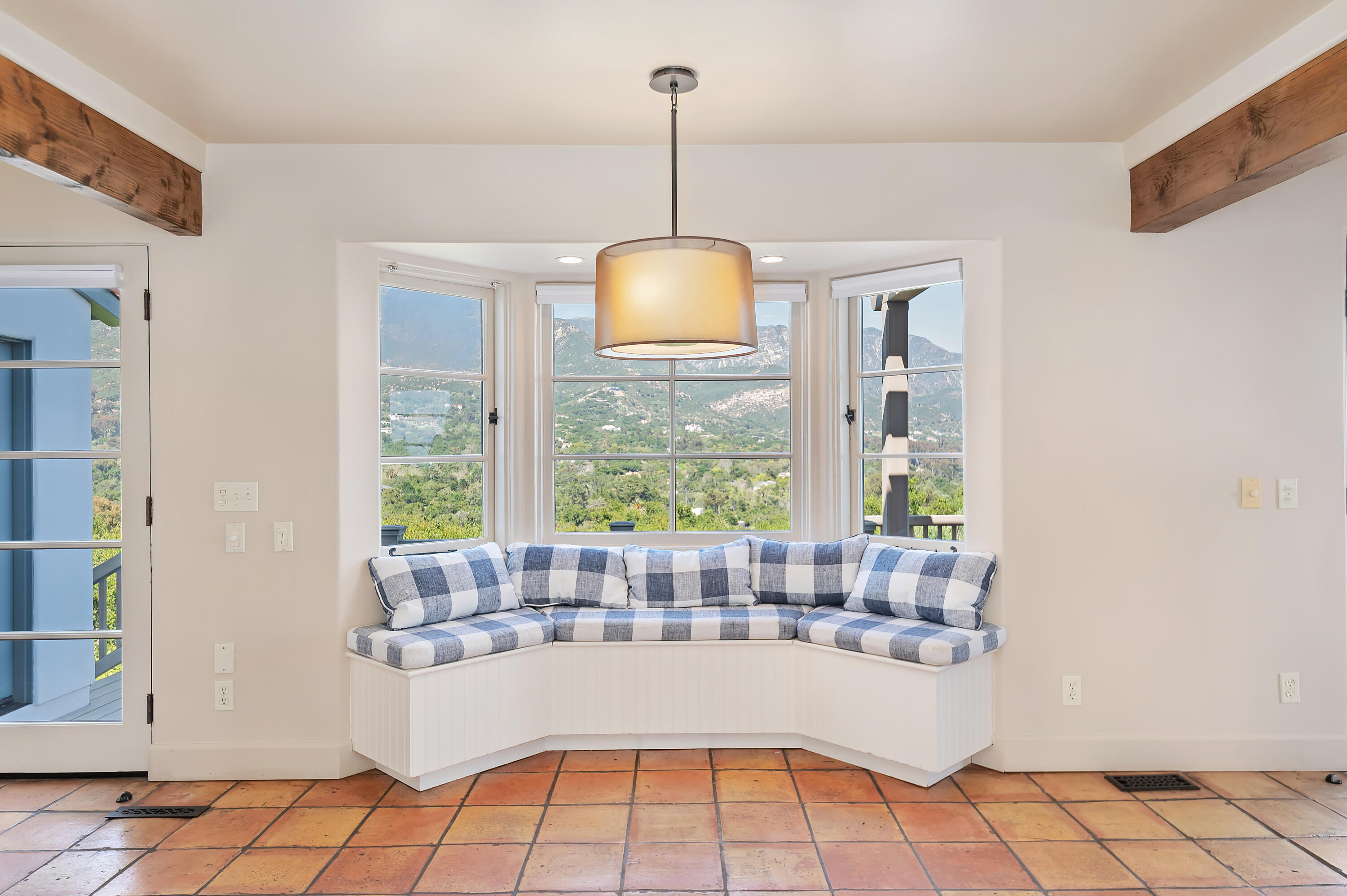 931 Knapp Drive Santa Barbara, CA 93108 - Photo 12 of 40 a white building with glass windows