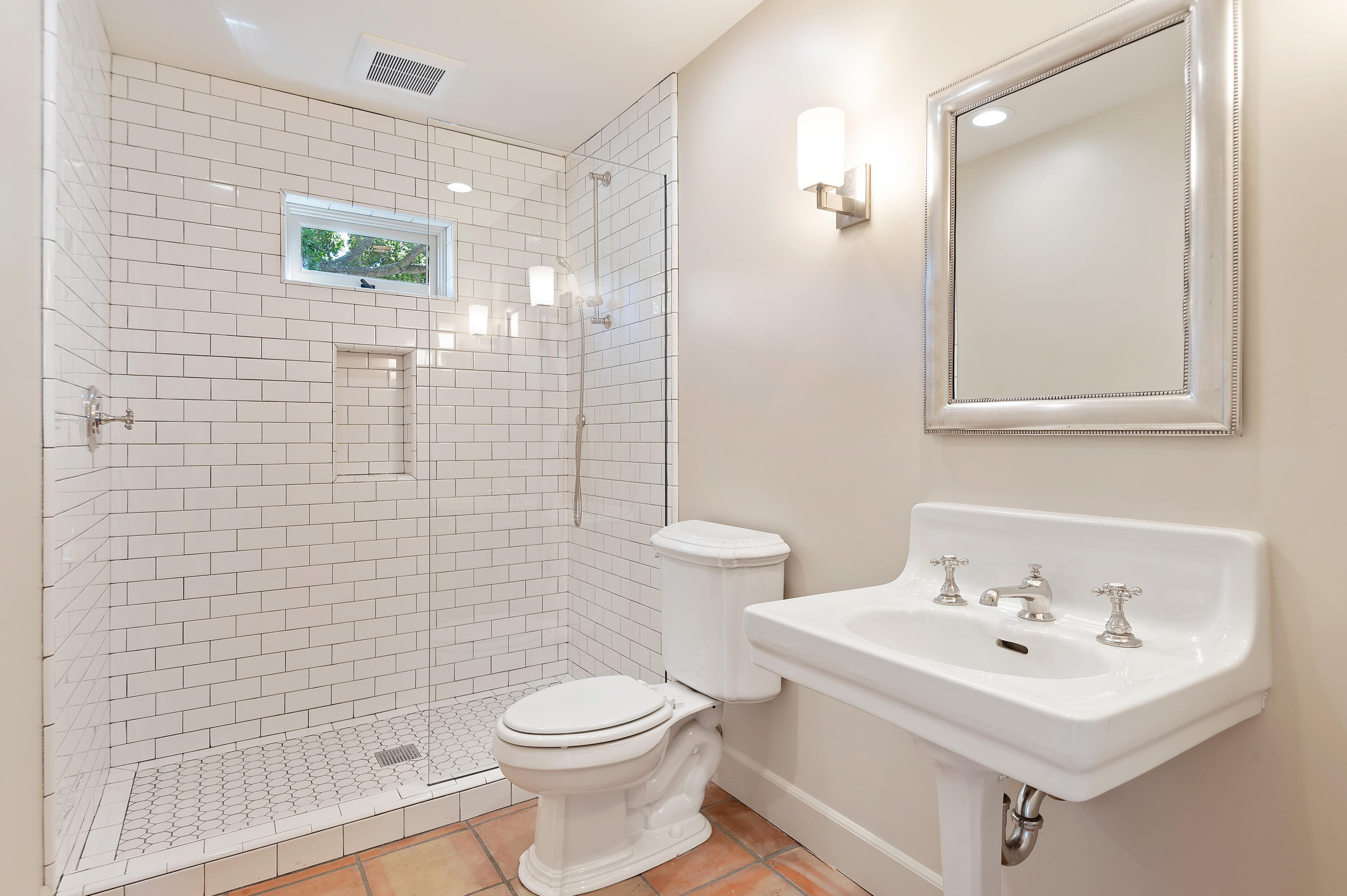 931 Knapp Drive Santa Barbara, CA 93108 - Photo 19 of 40 a bathroom with a sink a toilet and shower