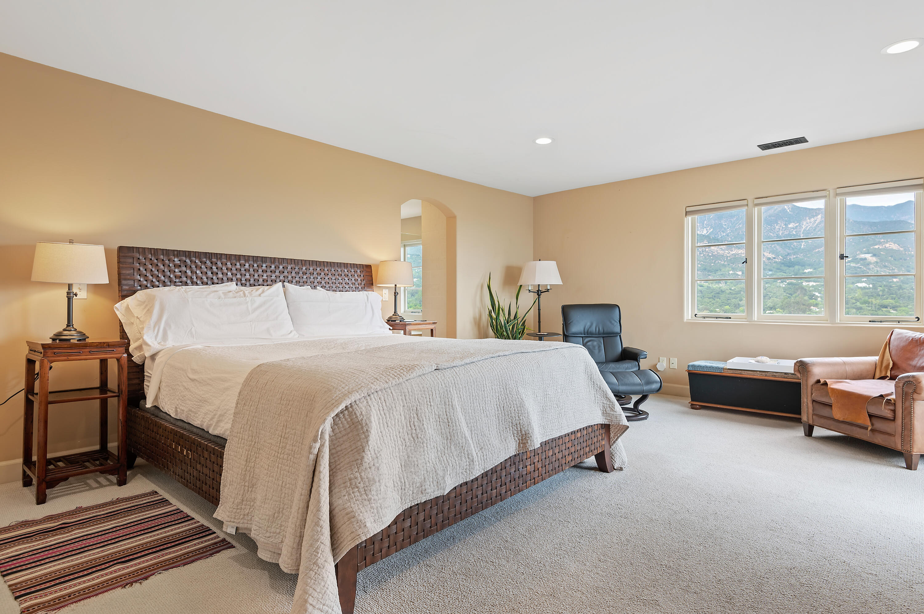 931 Knapp Drive Santa Barbara, CA 93108 - Photo 21 of 40 a bed room with a bed and a couch