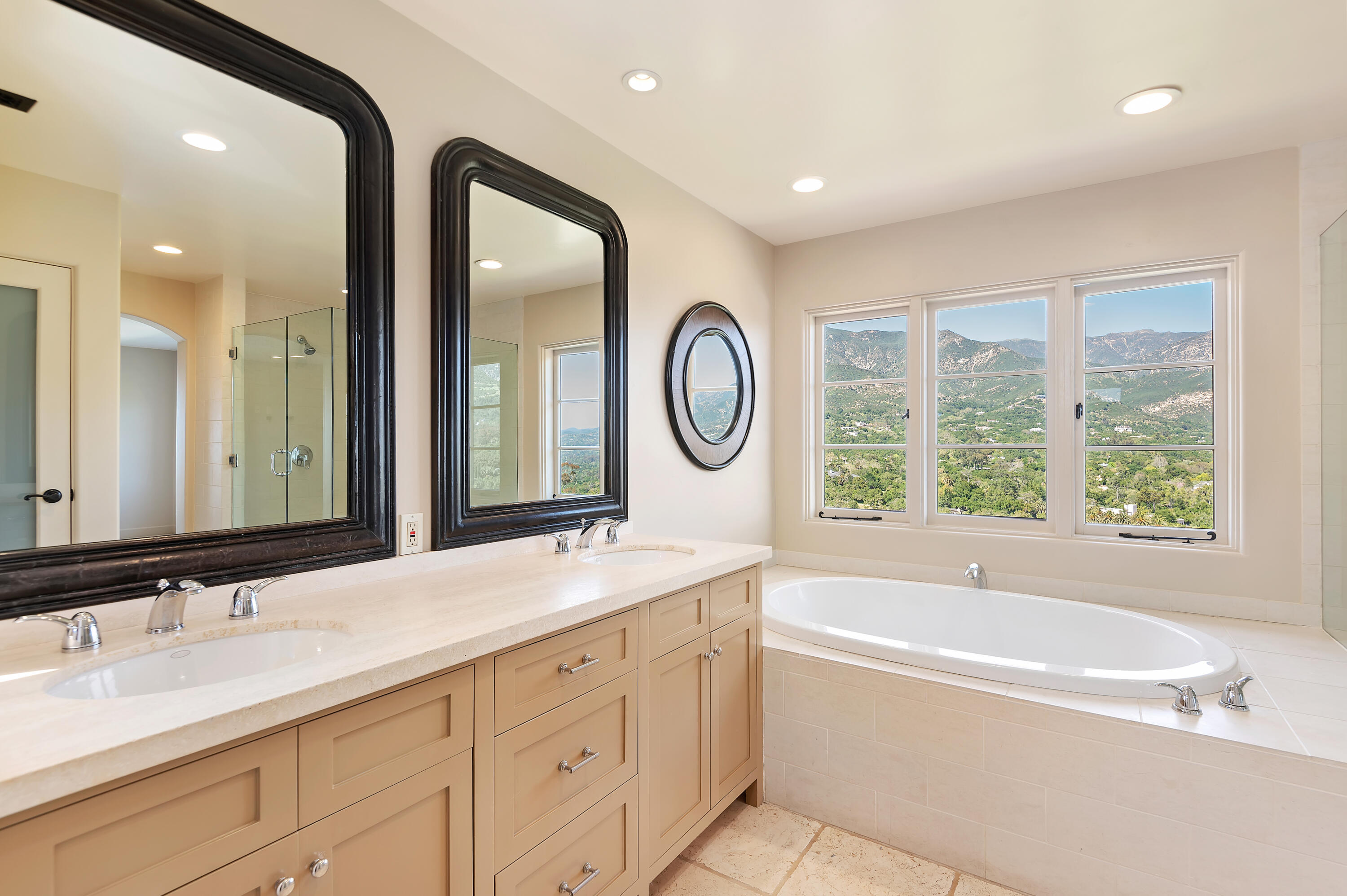 931 Knapp Drive Santa Barbara, CA 93108 - Photo 22 of 40 a bathroom with a large tub sink and mirror