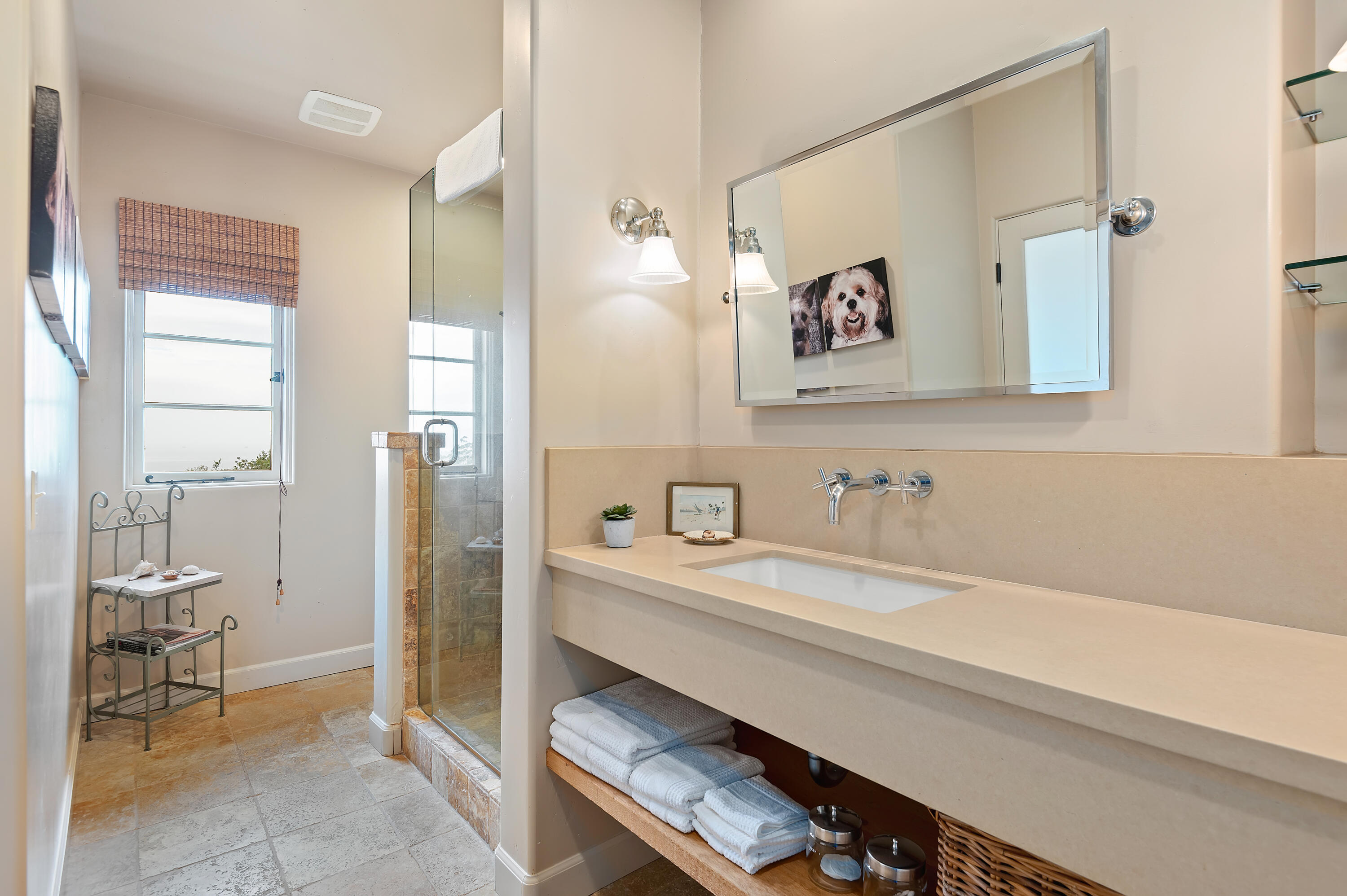 931 Knapp Drive Santa Barbara, CA 93108 - Photo 27 of 40 a bathroom with a sink a vanity and a mirror