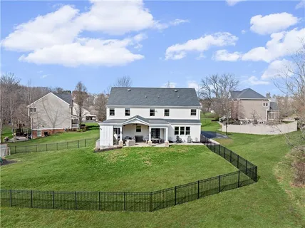 a view of a house with a big yard