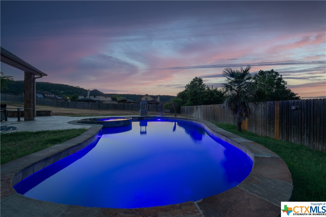 a view of outdoor space with swimming pool