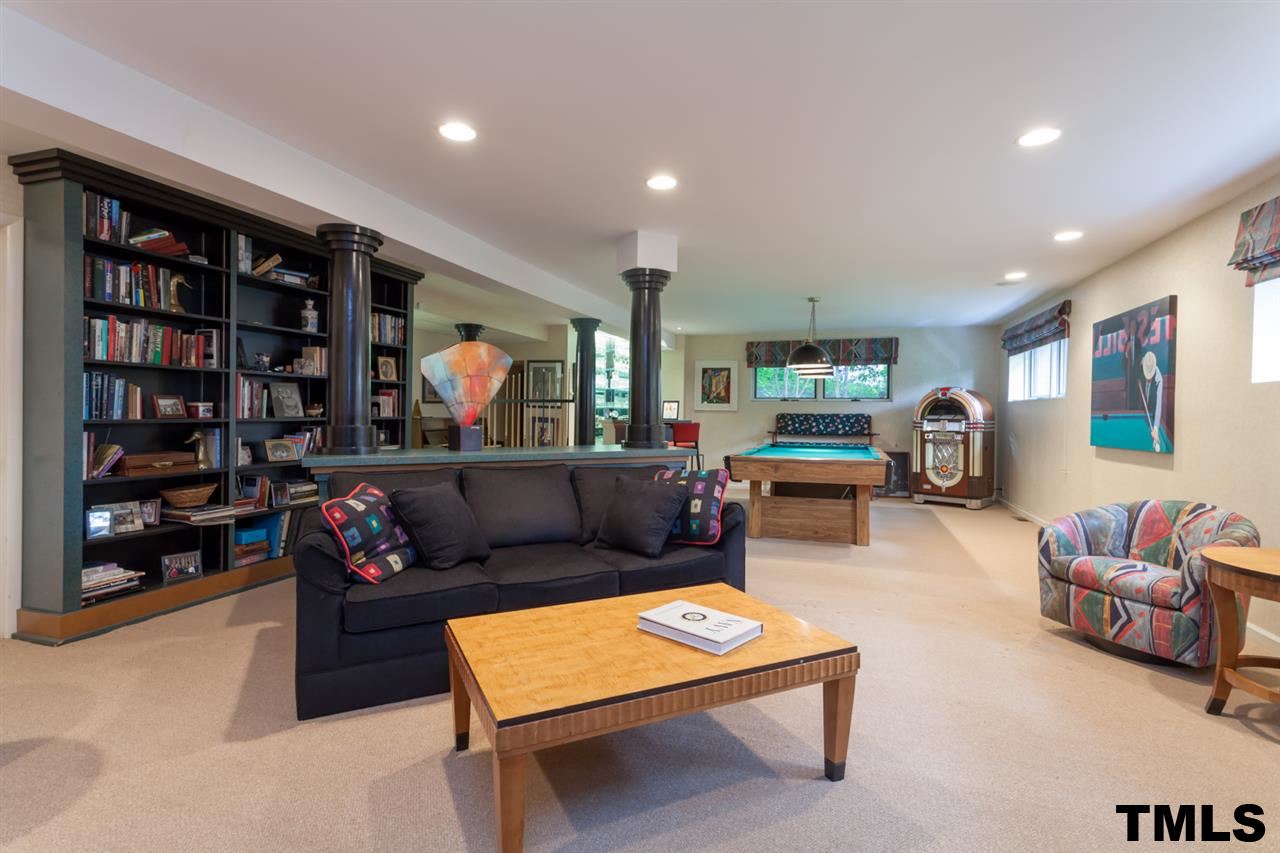 709 Brunswick Street Raleigh, NC 27609 - Photo 21 of 25 Finished with built-in bookshelves and full bath.