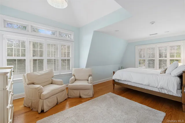 a bed room with a bed and a couch