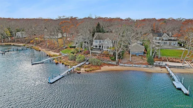 an aerial view of a town with couple of houses