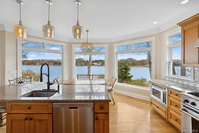 a kitchen with counter top space and appliances