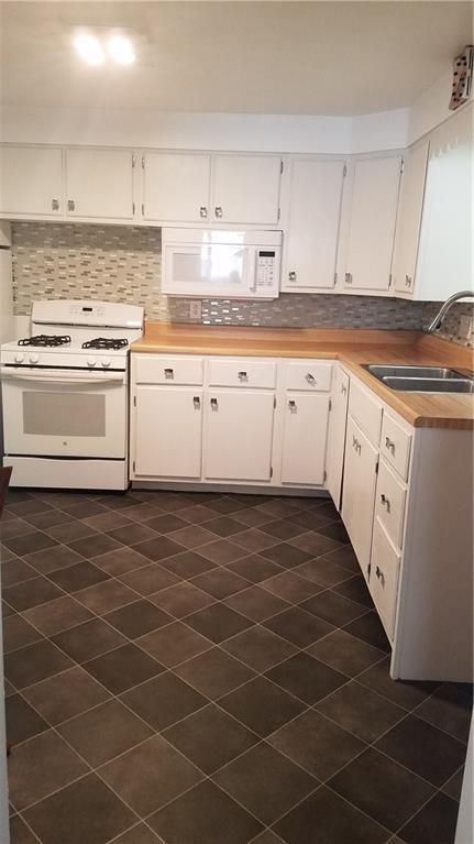 4021 Portman Avenue Pittsburgh, PA 15214 - Photo 3 of 16 Enjoy family meals in the bright eat in kitchen.