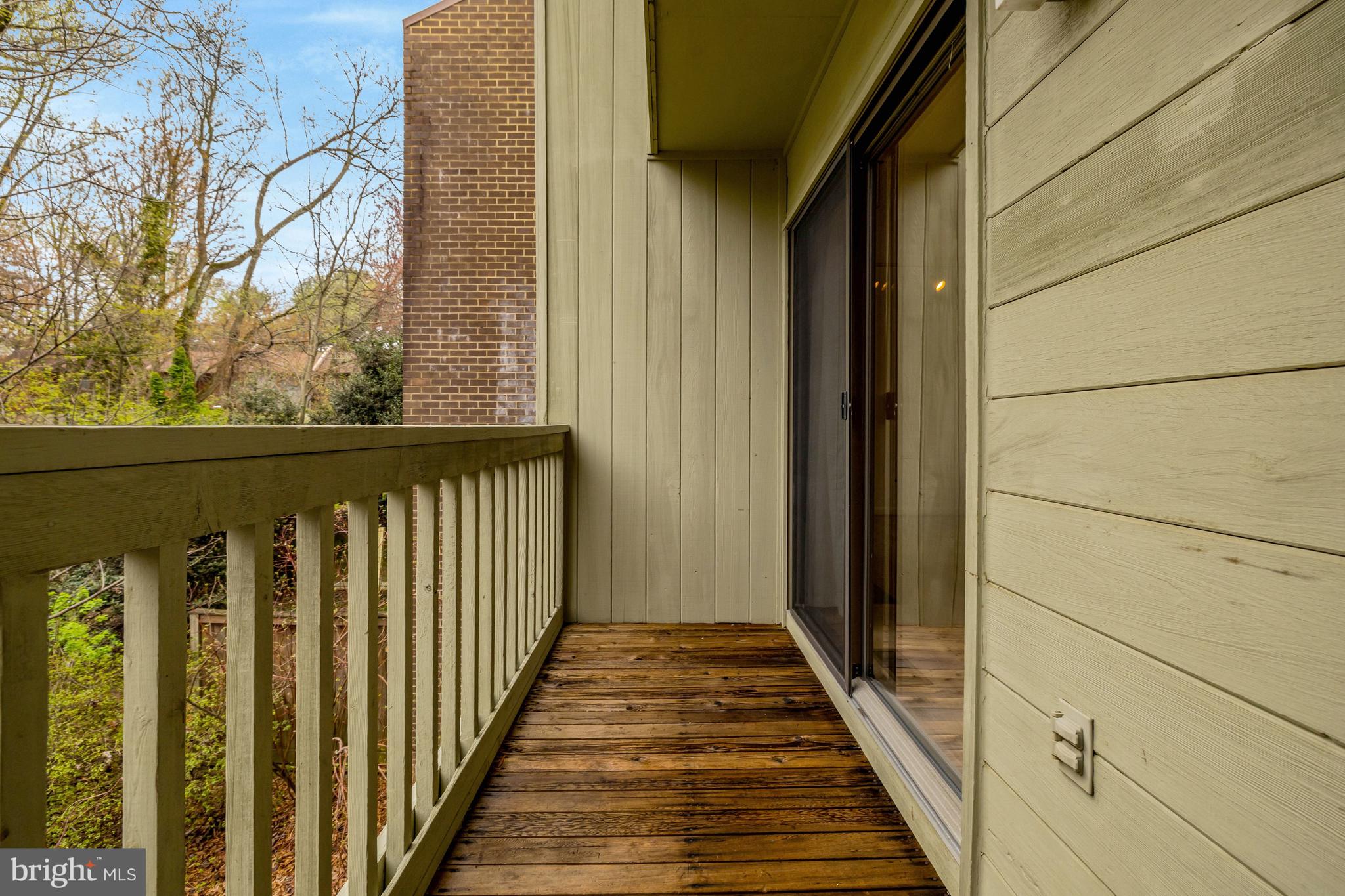 1752 Wainwright Drive Reston, VA 20190 - Photo 10 of 51 Balcony off of Dining Room overlooking trees