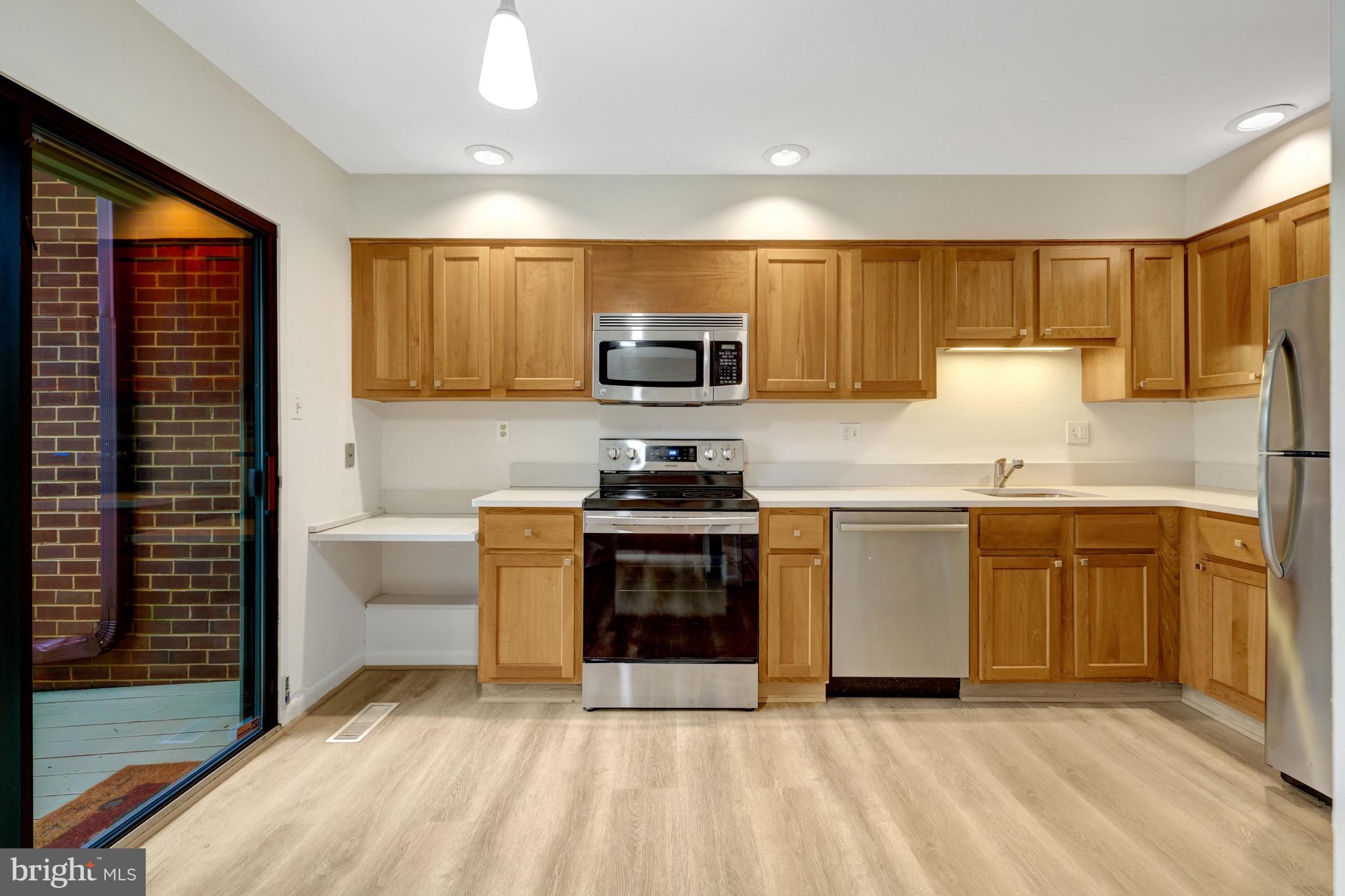 1752 Wainwright Drive Reston, VA 20190 - Photo 12 of 51 Updated Kitchen - Cherry cabinets & quartz counter