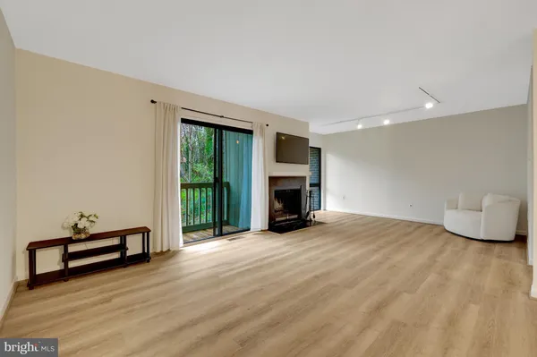a kitchen with a refrigerator sink and microwave