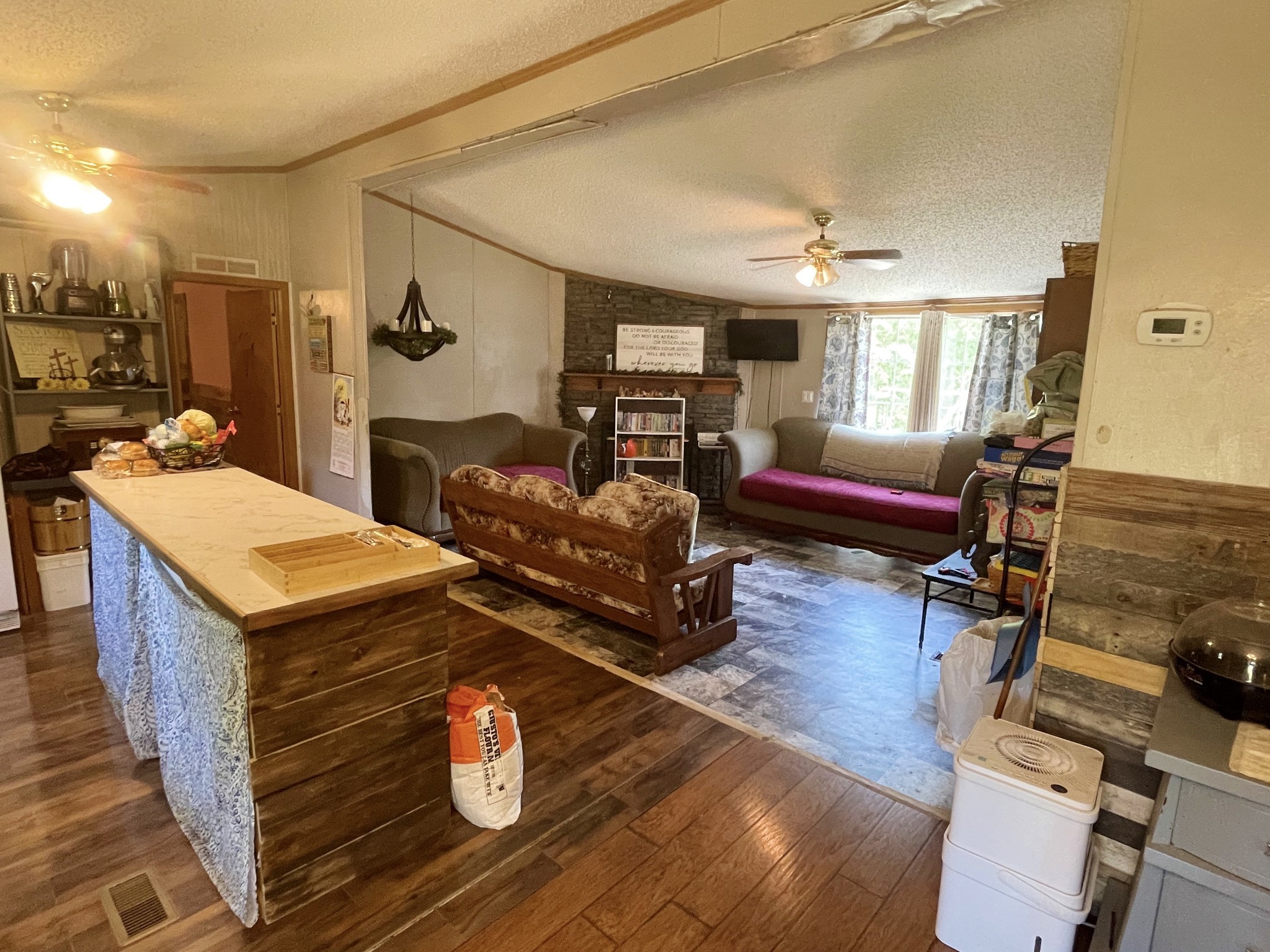 126 Yoder Lane Summertown, TN 38483 - Photo 14 of 69 a living room with furniture and wooden floor