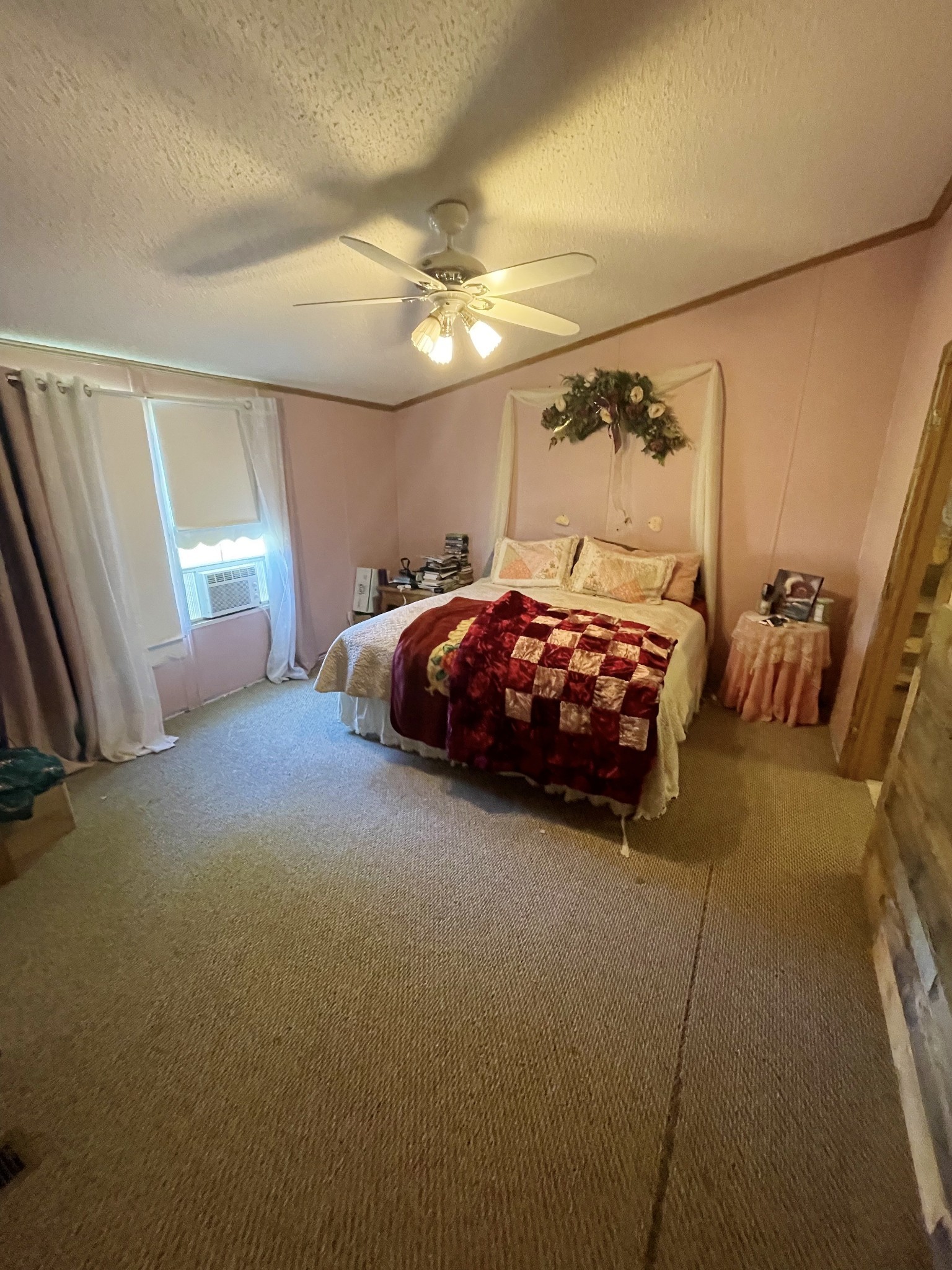 126 Yoder Lane Summertown, TN 38483 - Photo 17 of 69 a bed room with a bed and a couch