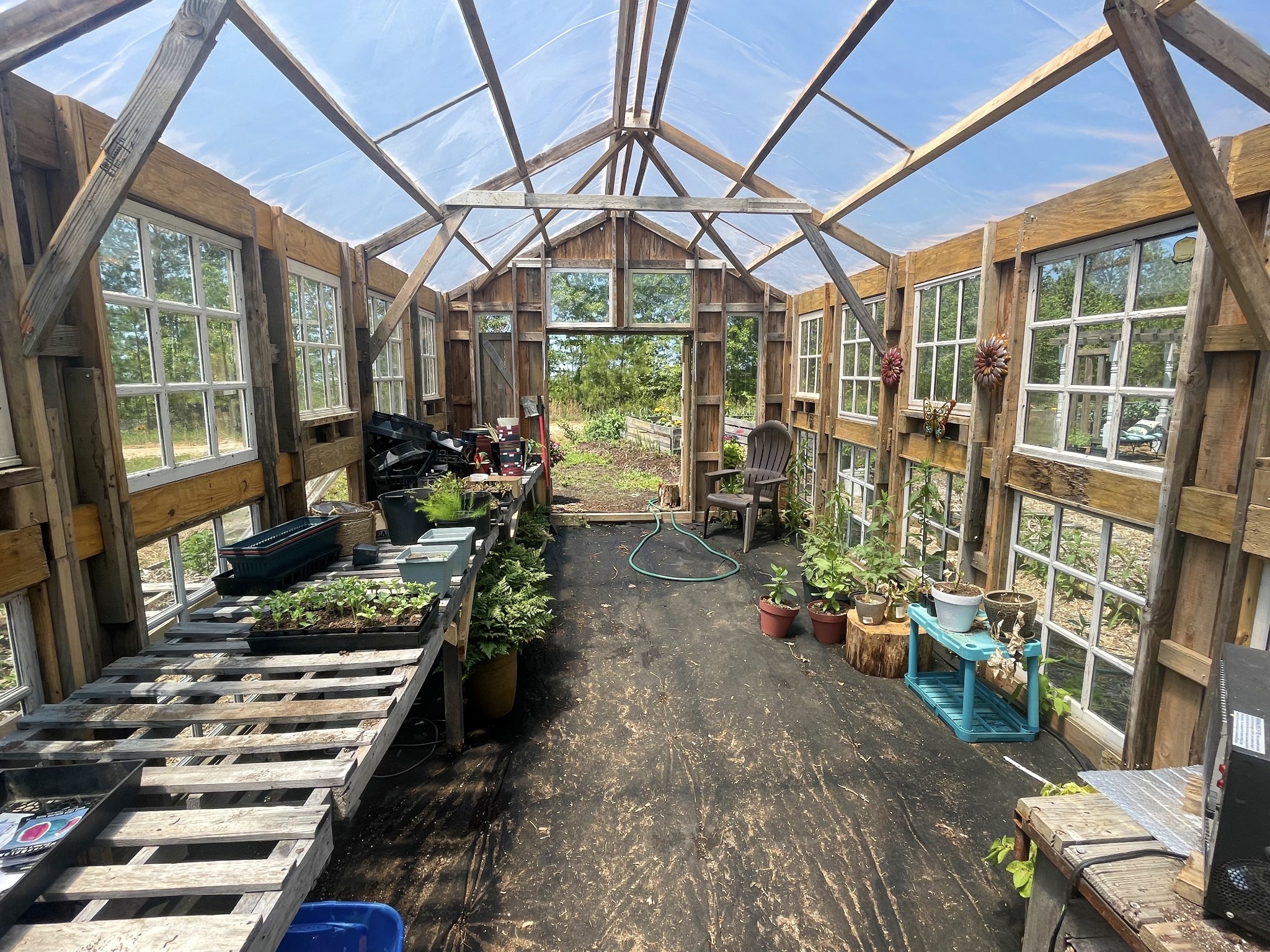 126 Yoder Lane Summertown, TN 38483 - Photo 2 of 69 a room with lots of wooden furniture and a potted plant