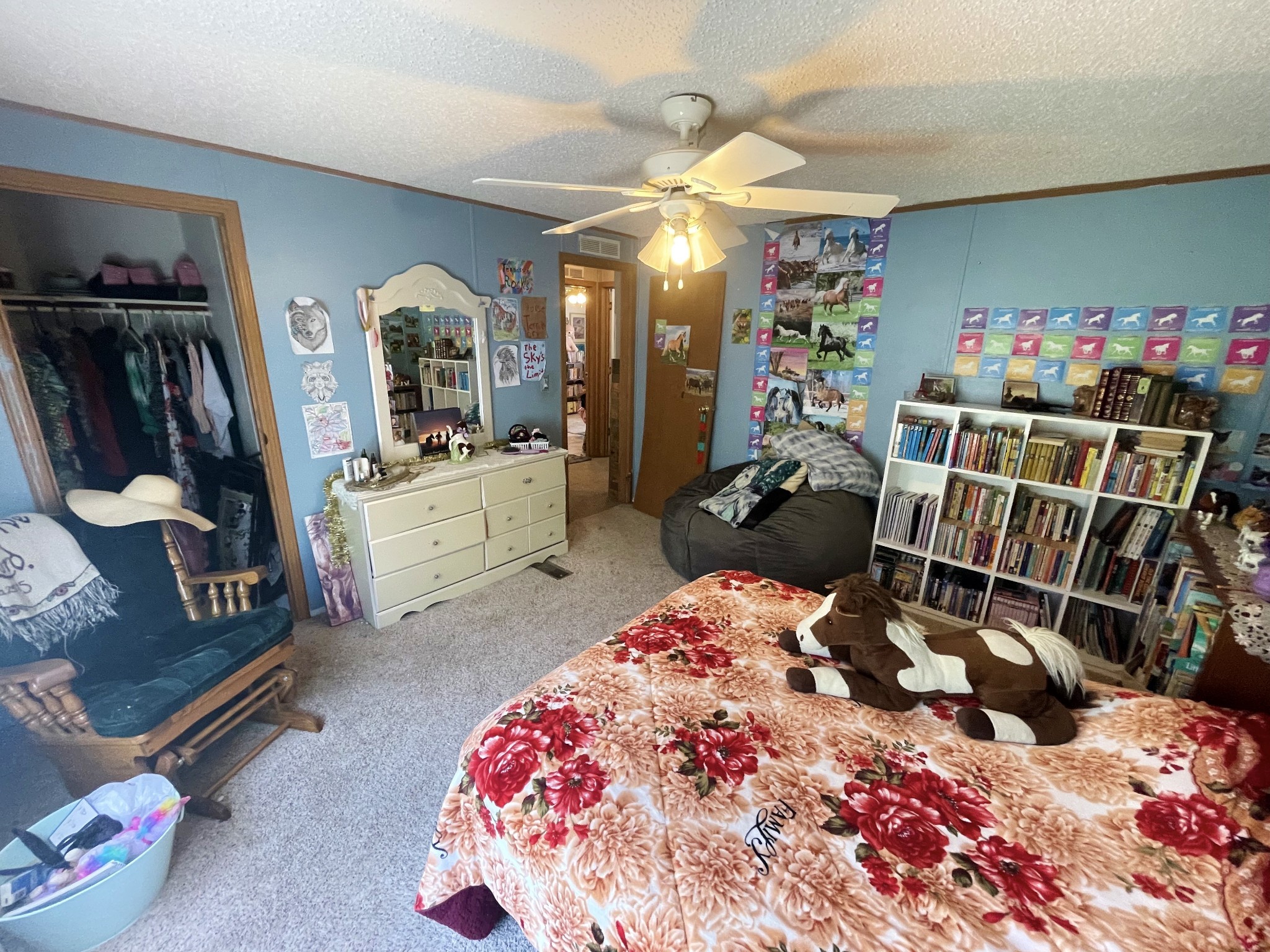 126 Yoder Lane Summertown, TN 38483 - Photo 24 of 69 a bedroom with a bed and wooden floor