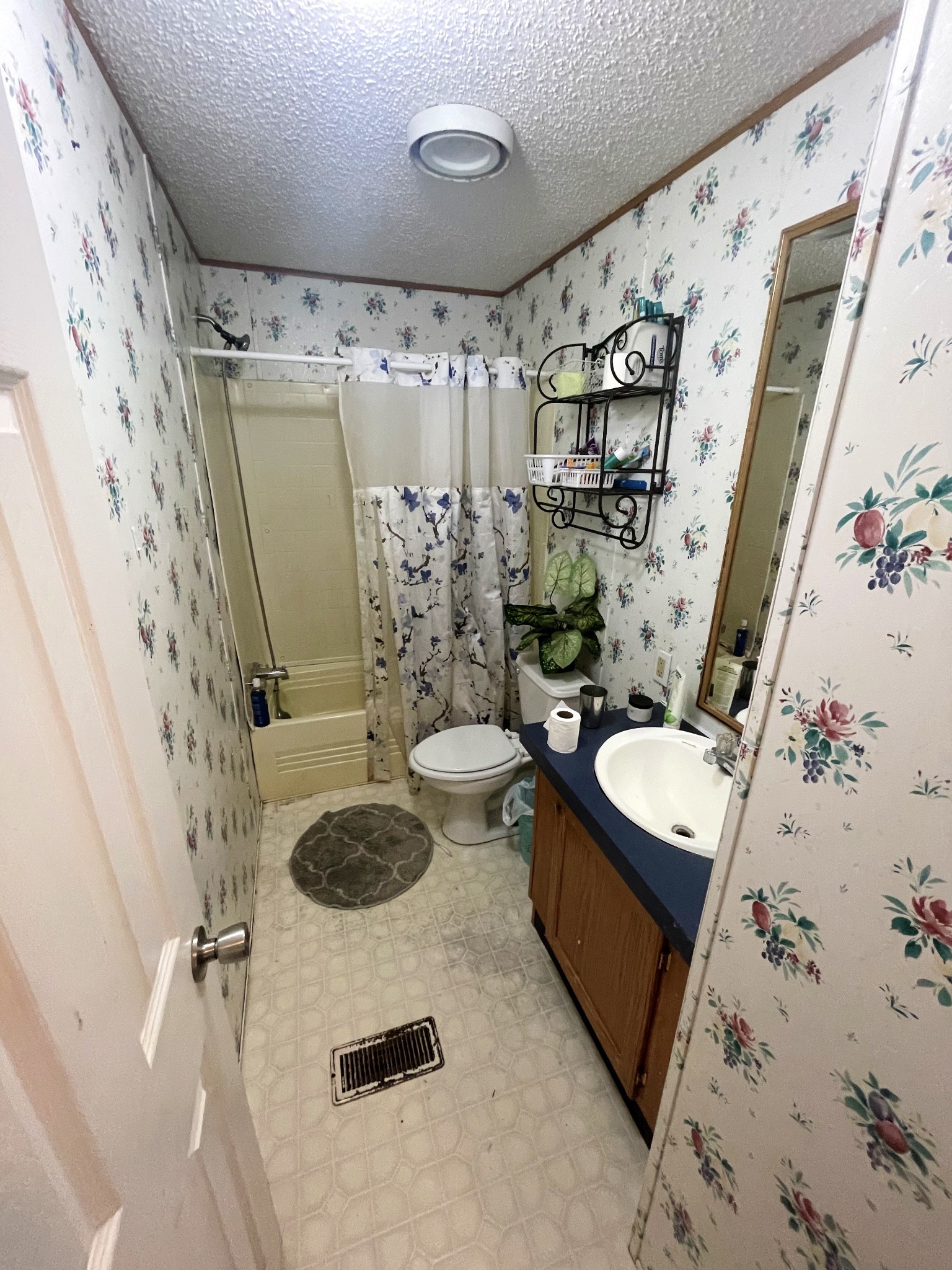126 Yoder Lane Summertown, TN 38483 - Photo 27 of 69 a bathroom with a granite countertop sink and a mirror